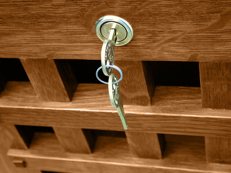 tall wood mailbox lock and key closeup
